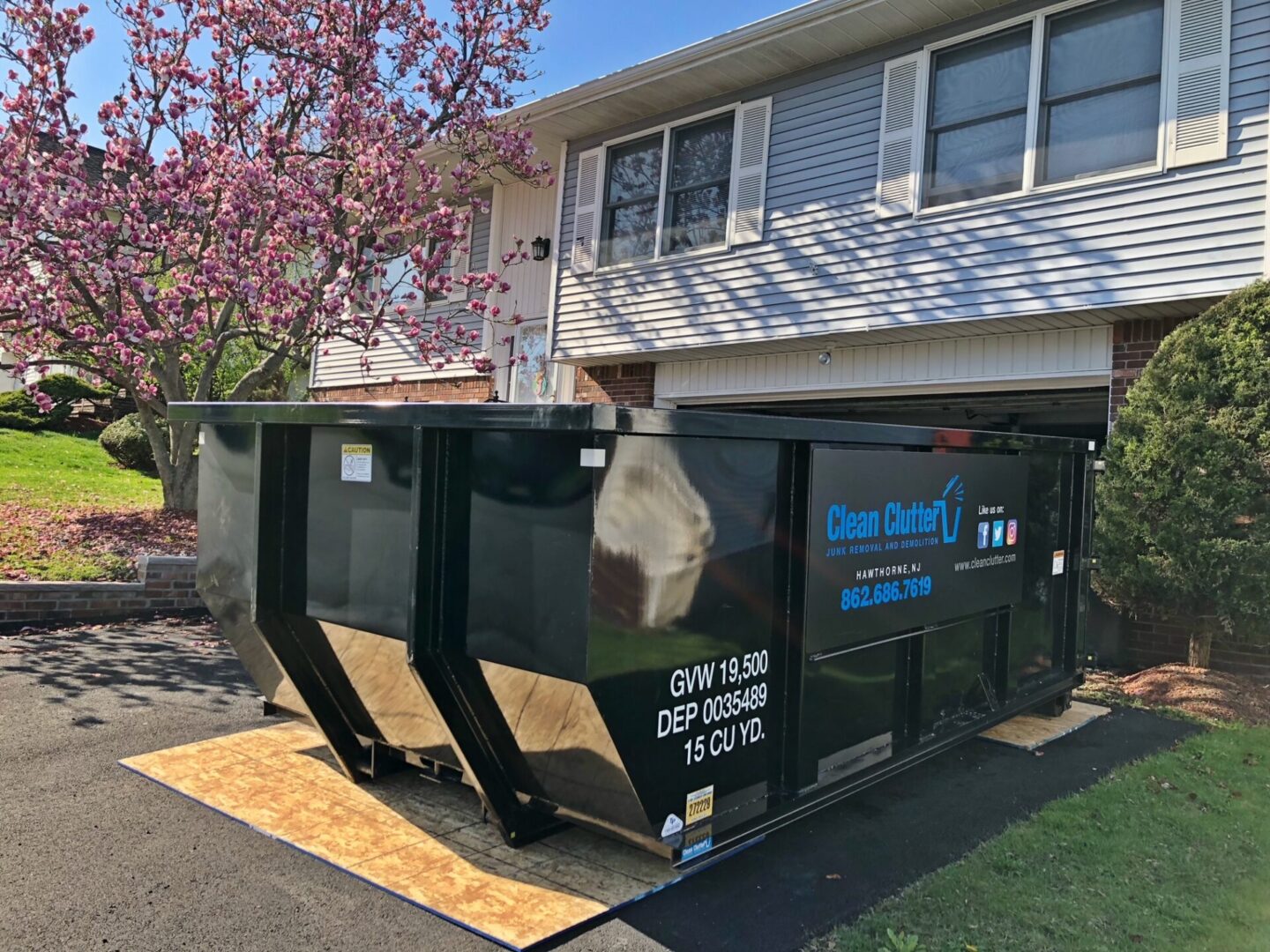 Clean Clutter small dumpster rental at job site